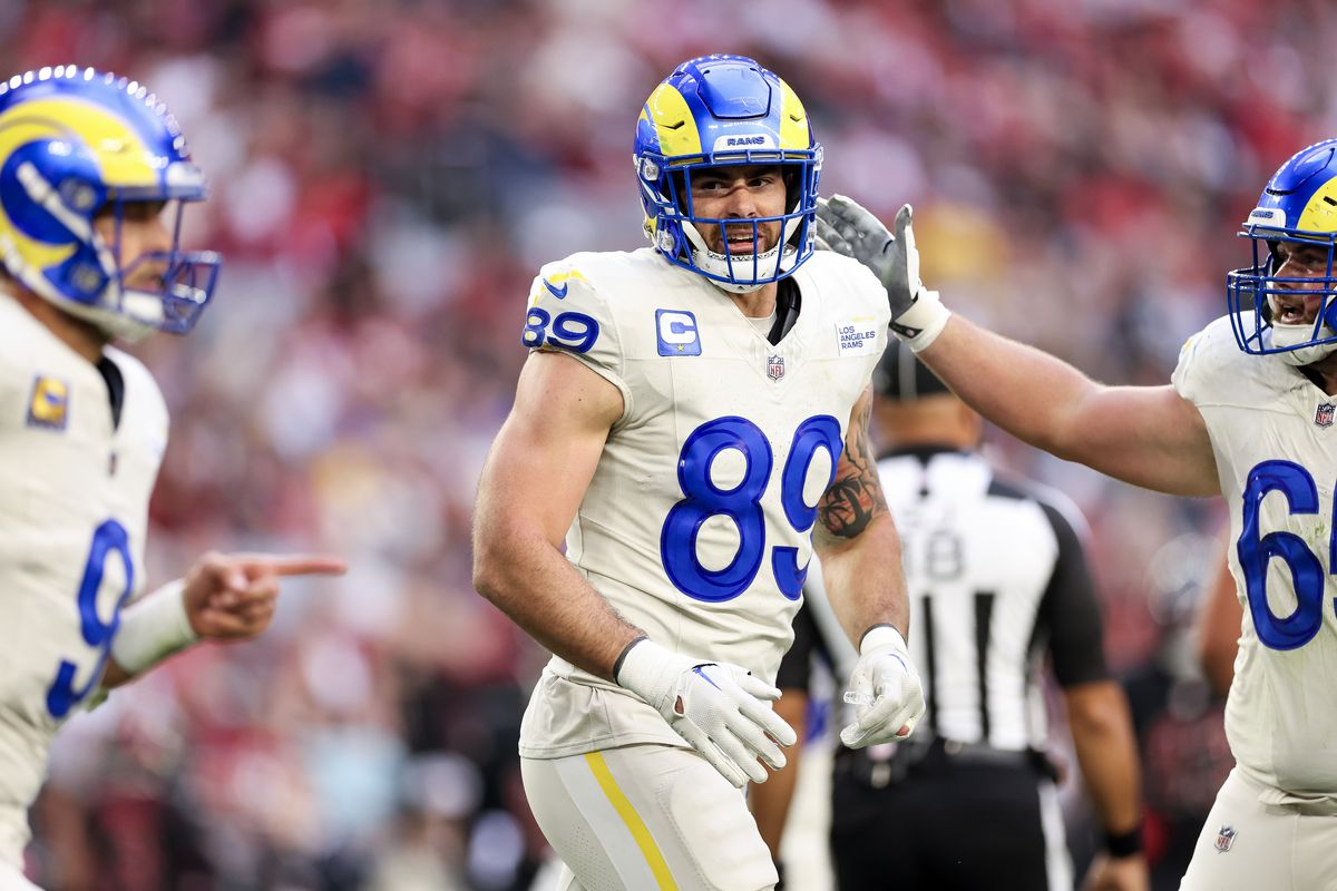 Tyler Higbee of the Los Angeles Rams reacts after his receiving touchdown during the second quarter against the Arizona Cardinals at State Farm Stadium on November 26, 2023 in Glendale, Arizona.