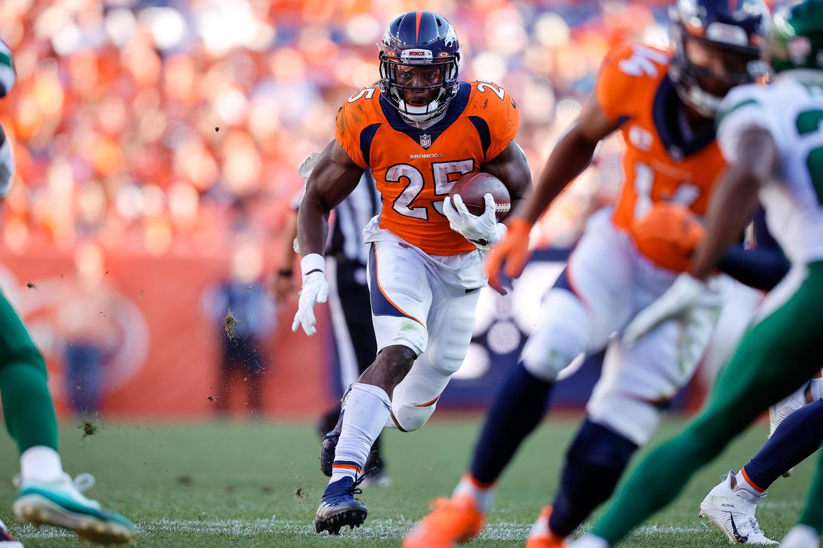 Denver Broncos running back Melvin Gordon III (25) runs the ball in the fourth quarter against the New York Jets at Empower Field at Mile High.&nbsp;