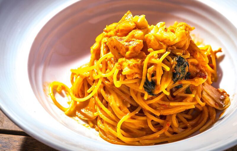 Santina’s lobster pasta sits in a white bowl.