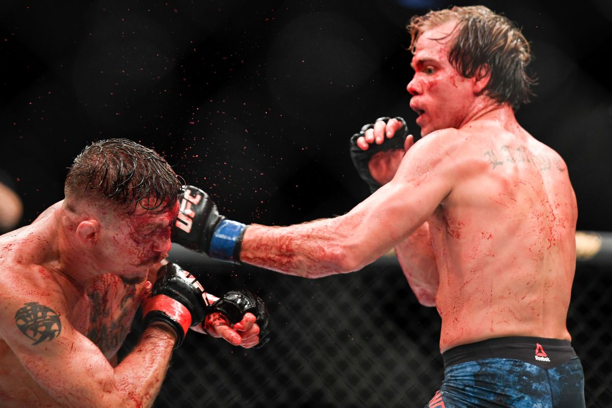 Nate Landwehr of the United States fights Darren Elkins of the United States in their Featherweight bout during UFC Fight Night at VyStar Veterans Memorial Arena on May 16, 2020 in Jacksonville, Florida.
