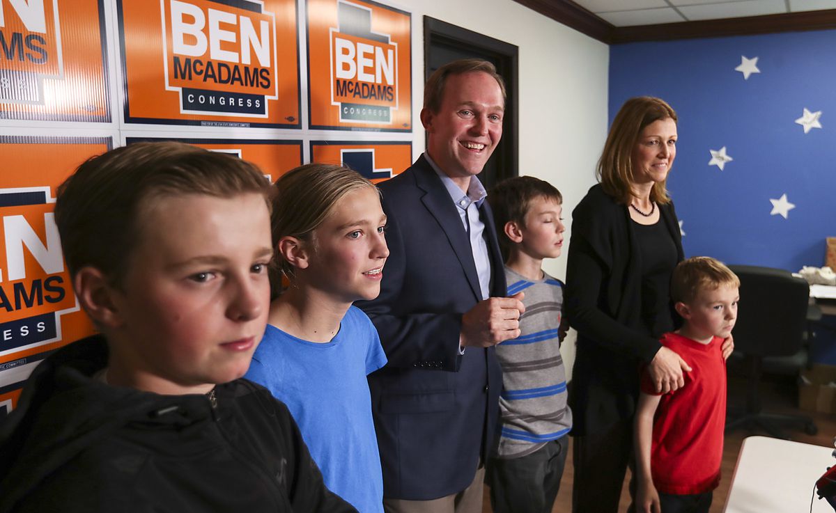 FILE - Democratic Salt Lake County Mayor Ben McAdams stands with his family as he speaks at a news conference, Monday, Nov. 19, 2018, in Millcreek, Utah. McAdams declared victory Monday night in the tight race for a U.S. House seat in Utah, but his oppone