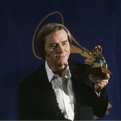 FILE - In this Feb. 25, 1981 file photo, Country singer George Jones poses with the Grammy he won for best male country vocal performance of "He Stopped Loving Her Today", at the awards at Radio City Music Hall in New York.  Jones, the peerless, hard-living country singer who recorded dozens of hits about good times and regrets and peaked with the heartbreaking classic "He Stopped Loving Her Today," has died. He was 81. Jones died Friday, April 26, 2013 at Vanderbilt University Medical Center in Nashville after being hospitalized with fever and irregular blood pressure, according to his publicist Kirt Webster. (AP Photo, file)