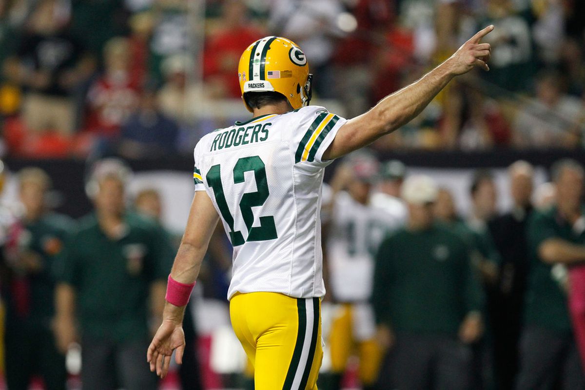 ATLANTA, GA - OCTOBER 09:  Aaron Rodgers #12 of the Green Bay Packers celebrates a play against the Atlanta Falcons at Georgia Dome on October 9, 2011 in Atlanta, Georgia.  (Photo by Kevin C. Cox/Getty Images)