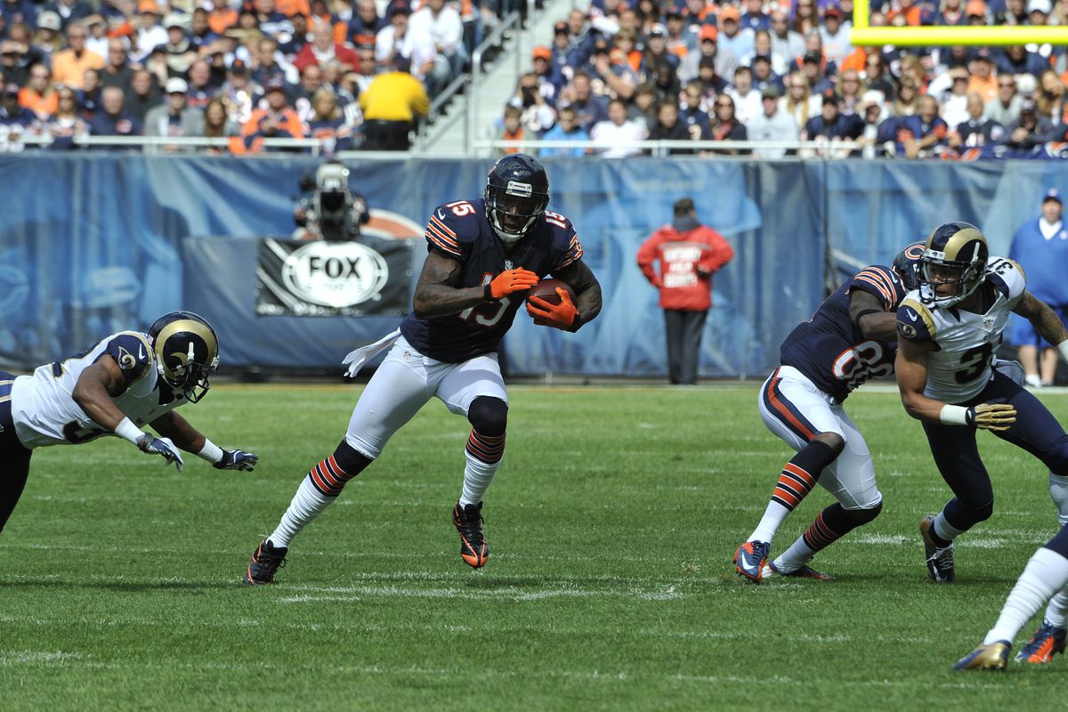 CHICAGO, IL- SEPTEMBER 23:  Brandon Marshall #15 of the Chicago Bears catches a pass as  Cortland Finnegan #31 of the St. Louis Rams tackles him on September 23, 2012 at Soldier Field in Chicago, Illinois.  (Photo by David Banks/Getty Images)