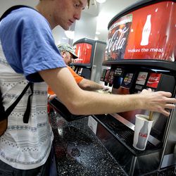 Freshman Cody McStraw gets a caffeinated soda at the Cougareat food court on the Brigham Young University campus in Provo on Thursday, Sept. 21, 2017. The Mormon church–run college is breaking a 60-year-old tradition by offering caffeinated sodas on campus.