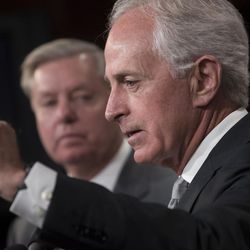 Senate Foreign Relations Committee Chairman Sen. Bob Corker, R-Tenn., accompanied by Sen. Lindsey Graham, R-S.C., speaks with reporters on Capitol Hill in Washington, Thursday, Aug. 3, 2017, after his panel approved the "Taylor Force Act," which suspends U.S. financial aid to the Palestinian Authority until it stops rewarding Palestinians who kill American and Israeli citizens. 