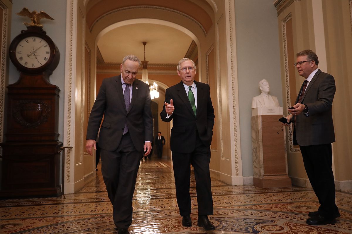 Senate Major Leader McConnell (R-KY) And Senate Minority Leader Schumer (D-NY) Walk To Senate Chamber Together After Budget Deal Reached