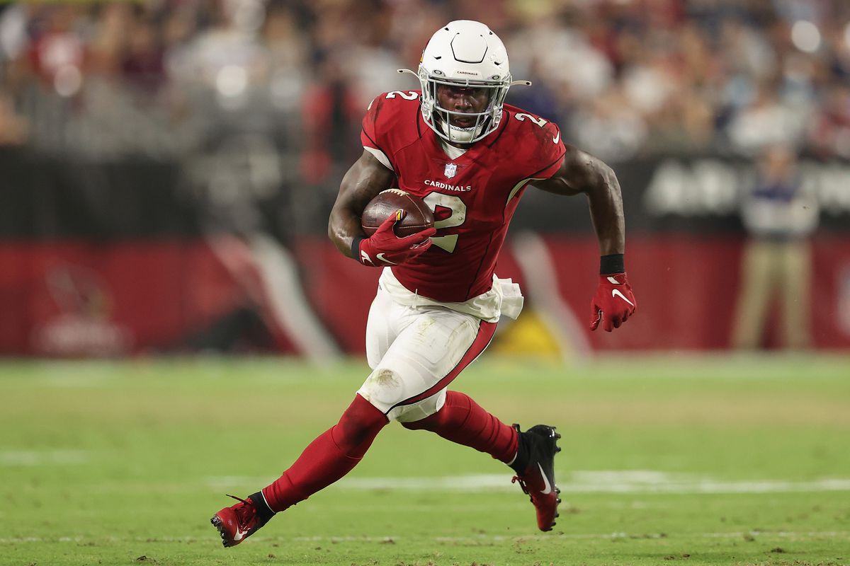 Running back Chase Edmonds #2 of the Arizona Cardinals rushes the football against the Dallas Cowboys during the first half of the NFL preseason game at State Farm Stadium on August 13, 2021 in Glendale, Arizona. The Cardinals defeated the Dallas Cowboys 19-16.
