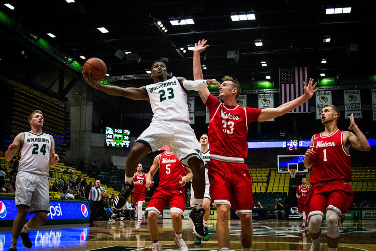 Utah Valley junior guard Brandon Randolph (left-center) goes up for the shot. He recorded a 20-point, 10-rebound, 10-assist triple-double on Monday night to lead UVU to a 113-87 win over Western State.