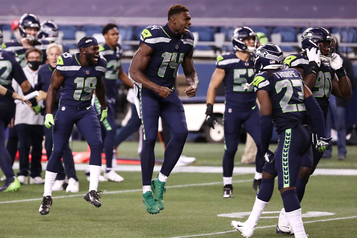 &nbsp;DK Metcalf #14 of the Seattle Seahawks celebrates with teammates after defeating the New England Patriots 35-30 at CenturyLink Field on September 20, 2020 in Seattle, Washington.