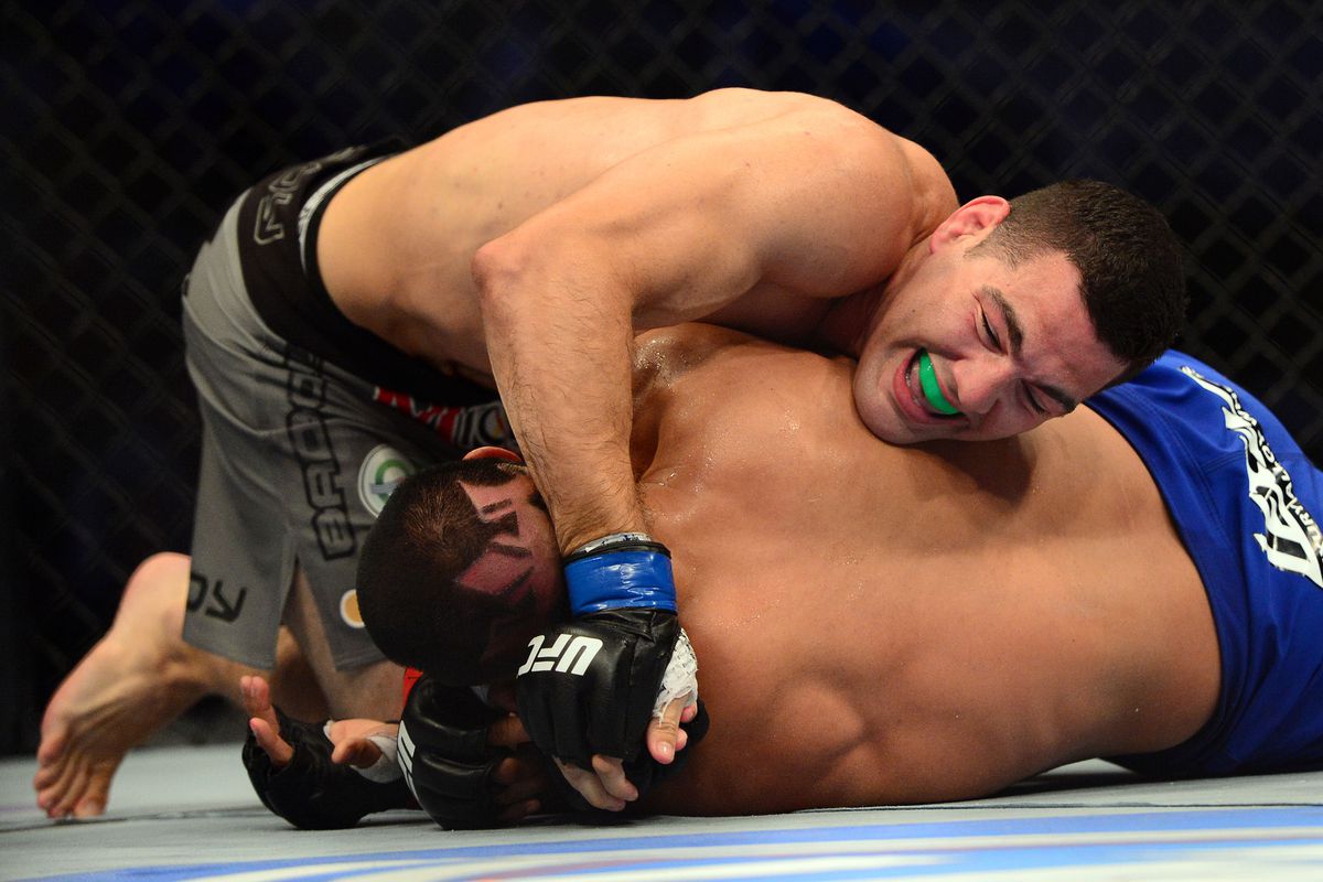 July 11, 2012; San Jose, CA, USA; Mark Munoz (bottom) fights Chris Weidman (top) during the middleweight bout of the UFC on Fuel TV at HP Pavilion. Mandatory Credit: Kyle Terada-US PRESSWIRE