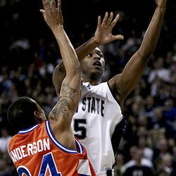 Guard Pooh Williams, here in action against Boise State, has matured into a defensive stopper for Utah State. 