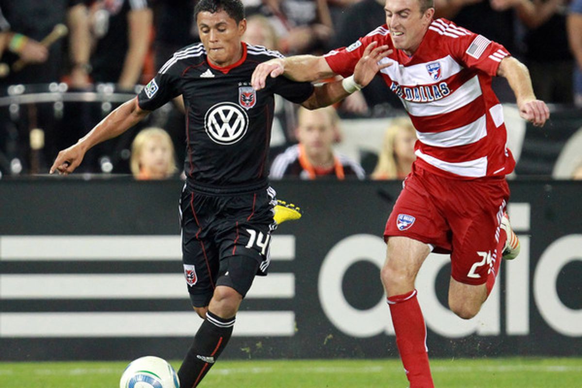 WASHINGTON - AUGUST 14: Andy Najar #14 of D.C. United controls the ball against Eric Alexander #24 of FC Dallas at RFK Stadium on August 14 2010 in Washington DC. (Photo by Ned Dishman/Getty Images)