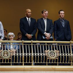 Mikhail Kotlov, left, Cedric Willis, Salt Lake County Mayor Ben McAdams, Branden Jenkins and Noella Sudbury, McAdams' senior policy adviser on criminal justice, stand to be honored in the Senate at the Capitol in Salt Lake City on Thursday, Feb. 1, 2018. Kotlov, Willis and Jenkins are clients of Operation Rio Grande's specialty drug court. Seated second from left is Pamela Atkinson, an advocate for the homeless.