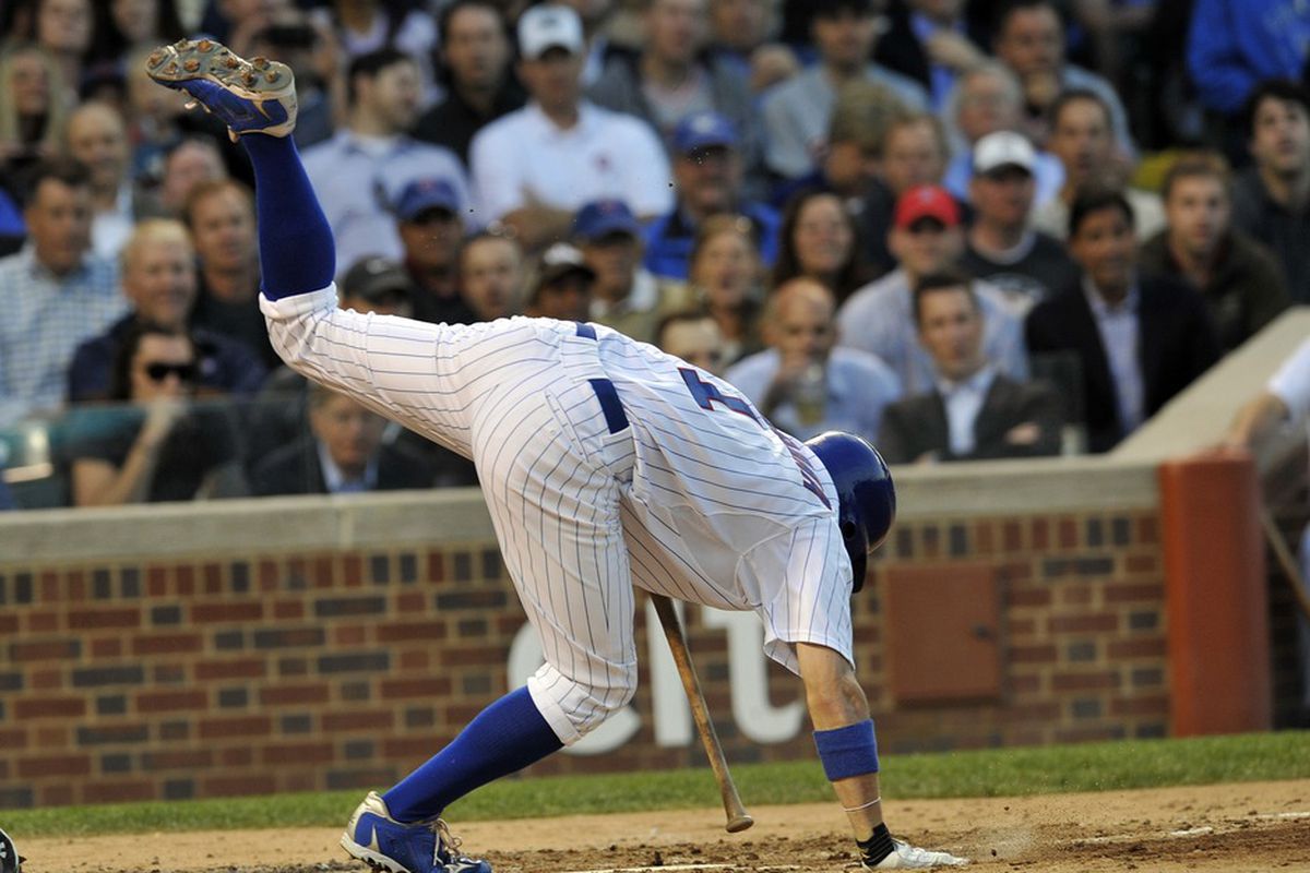 Write your own caption: Chicago, IL, USA; Chicago Cubs center fielder Tony Campana gets out of the way of an inside pitch against the Detroit Tigers at Wrigley Field. Credit: David Banks-US PRESSWIRE