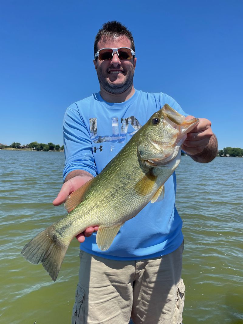 Matt McNamara, of Orland Park, holds one of several nice bass he caught on a Senko with guide Mike Norris. Provided photo