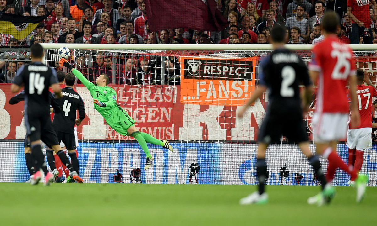 MUNICH, GERMANY - APRIL 12: Manuel Neuer, goalkeeper of Muenchen makes a save during the UEFA Champions League Quarter Final first leg match between FC Bayern Muenchen and Real Madrid CF at Allianz Arena on April 12, 2017 in Munich, Germany.