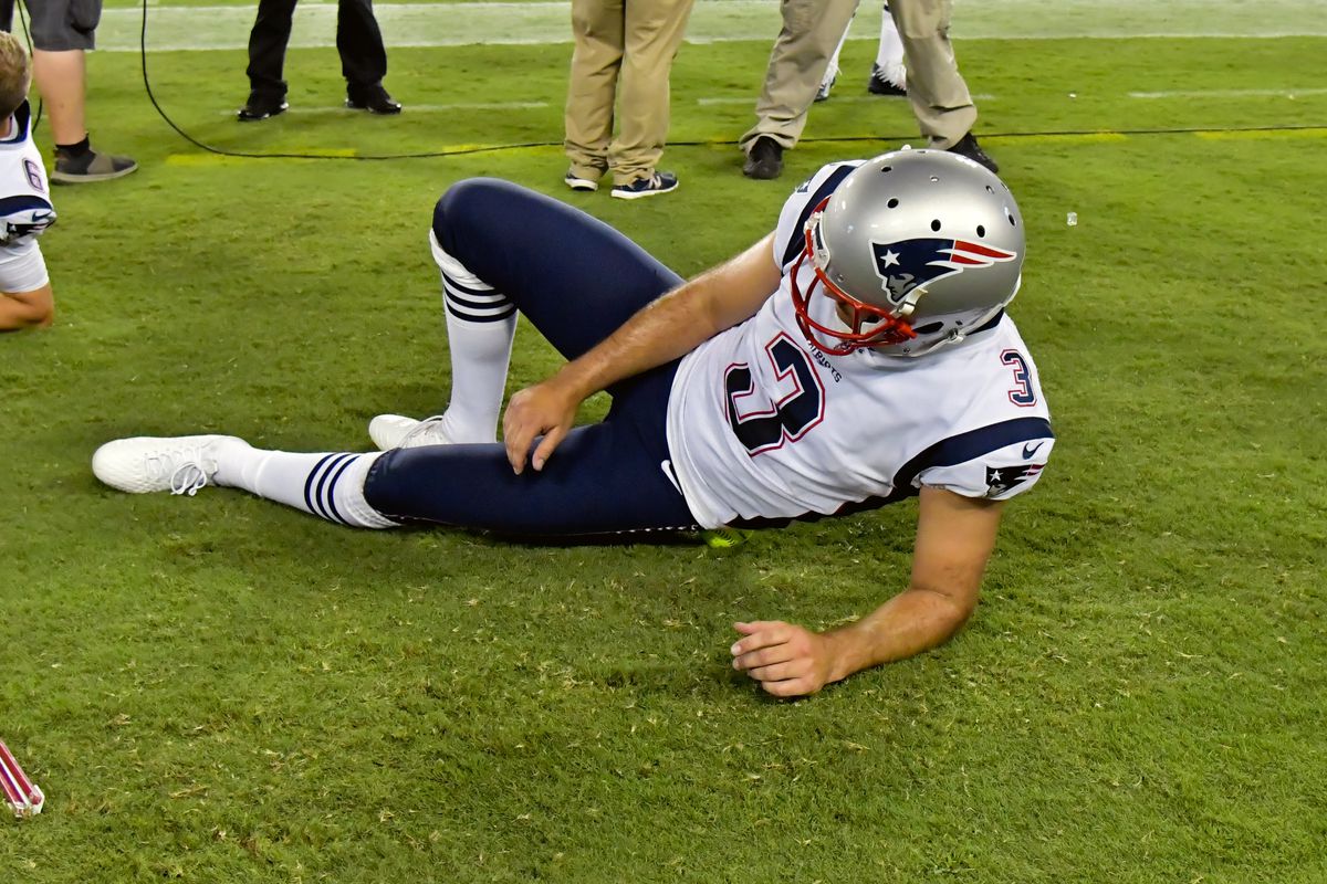 New England Patriots kicker Stephen Gostkowski stretches on the sideline during the second half against the Tennessee Titans at Nissan Stadium.