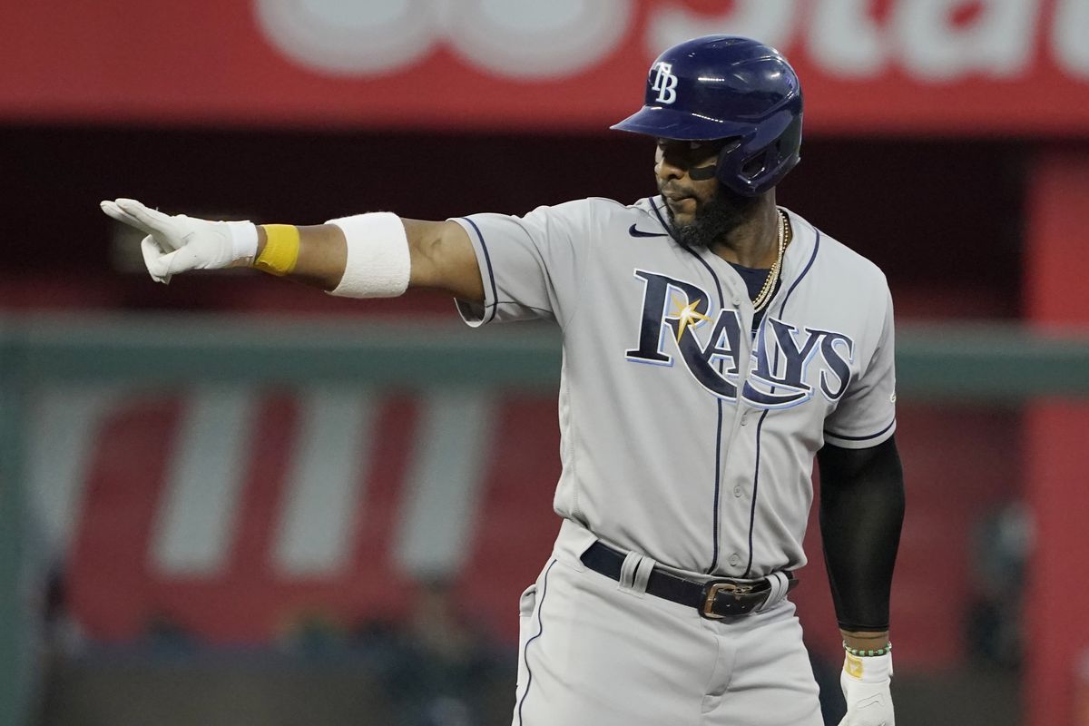 Yandy Diaz #2 of the Tampa Bay Rays celebrates a three-run double in the fourth inning against the Kansas City Royals at Kauffman Stadium