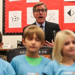Scott Anderson, Zions Bank president and CEO, speaks behind a row of second-graders at a press conference for the Our Schools Now campaign at Washington Elementary School in Salt Lake City on Tuesday, Nov. 29, 2016. The Our Schools Now campaign announced its support for an income tax increase to help fund education in the state.
