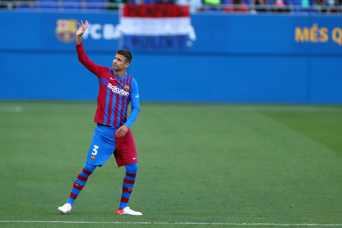 Gerard Pique of Fc Barcelona greets the fans before the...