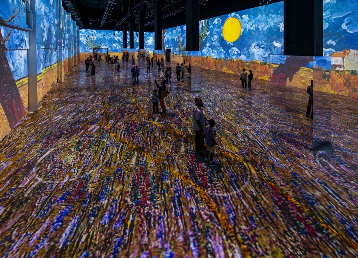 “Immersive Van Gogh” (shown at the Toronto site) envelops the visitor in the works of the iconic painter.