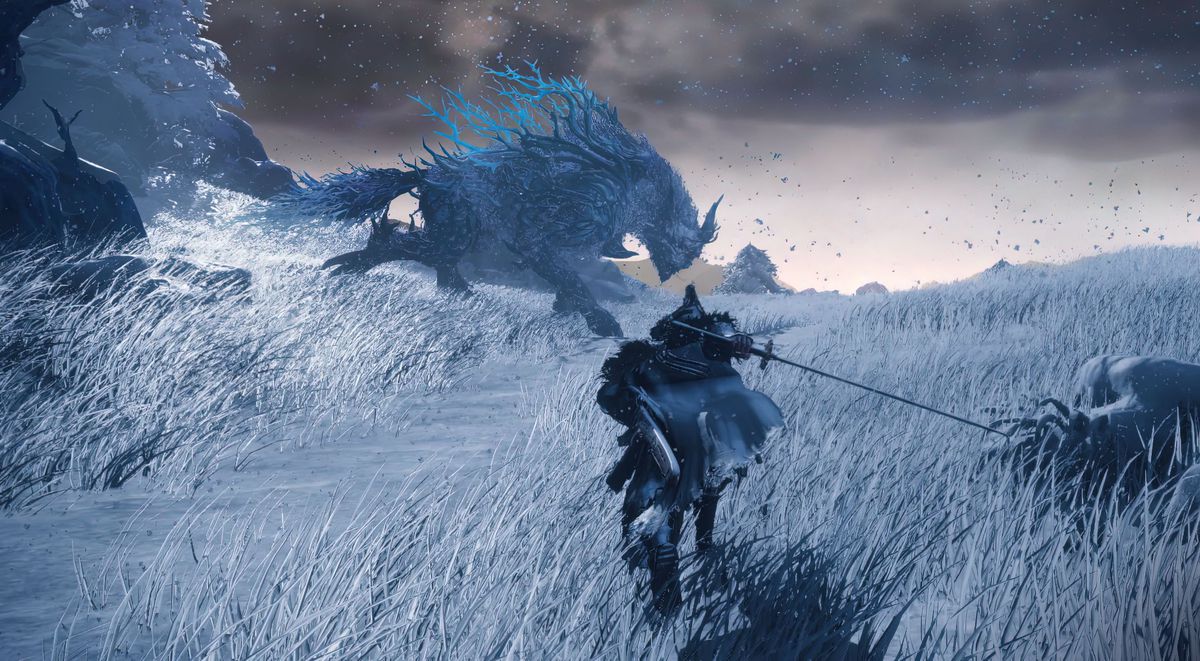 A warrior runs toward a giant wolf in Wild Hearts while wielding a huge katana.