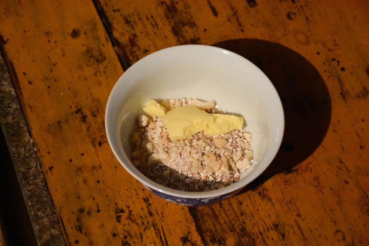 A bowl of yak butter and barley, before the tea is poured in.
