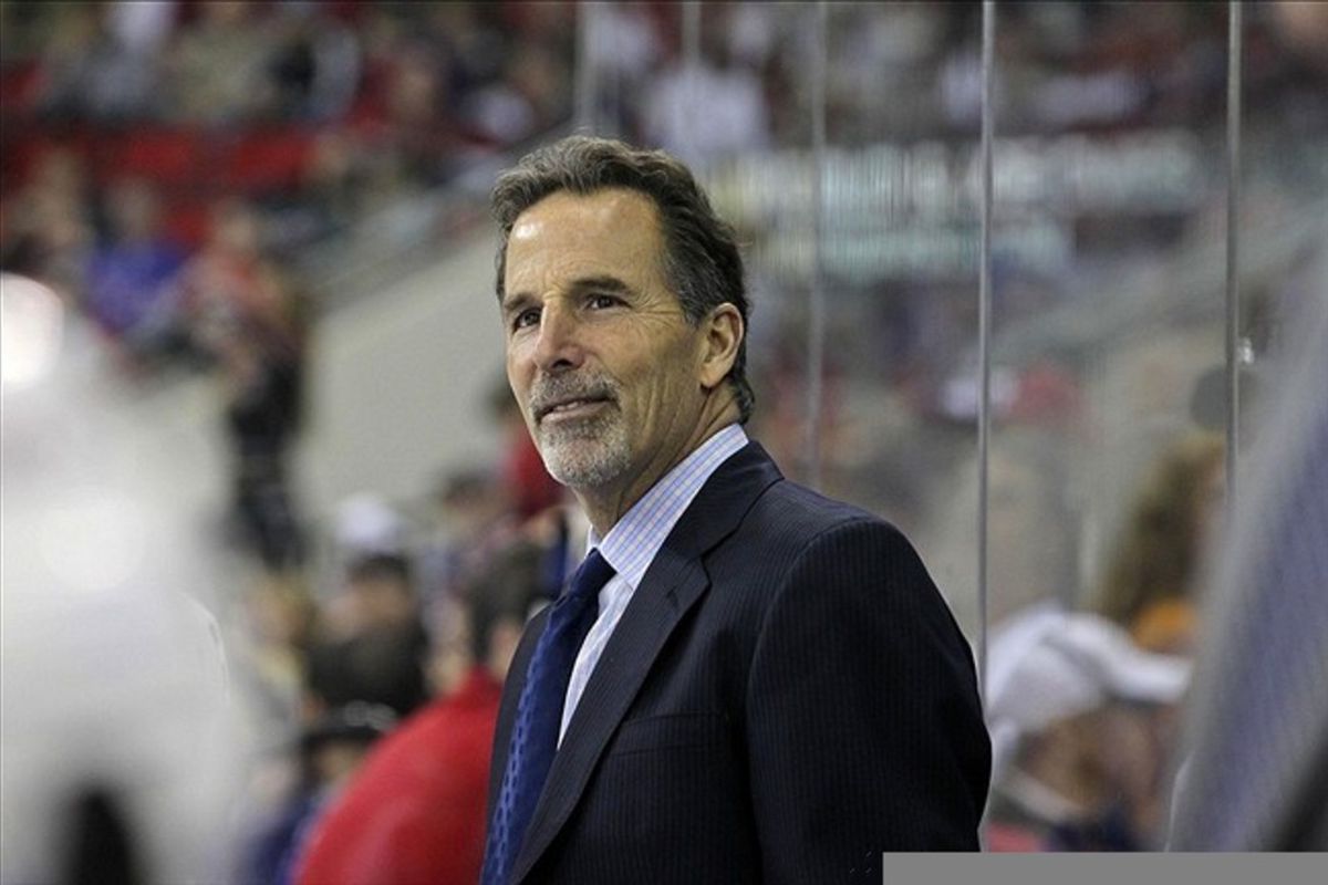 March 1, 2012; Raleigh, NC, USA; New York Rangers coach John Tortorella smiles during the game against the Carolina Hurricanes at the RBC center. The Rangers defeated the Hurricanes, 3-2. Mandatory Credit: James Guillory-US PRESSWIRE