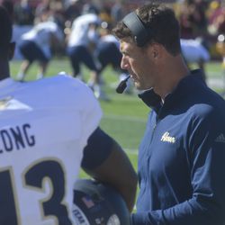 Akron head coach Tom Arth reacts to his team’s offensive performance. 