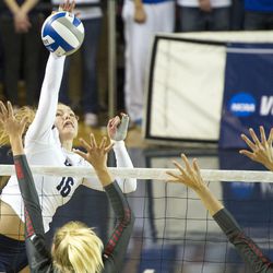 BYU middle hitter Whitney Young Howard spikes the ball during an NCAA volleyball playoff game against UNLV in Provo on Saturday, Dec. 3, 2016. BYU swept UNLV 3-0 to advance to the Sweet 16.