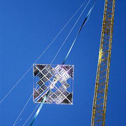 The climber travels up a 325-foot cable, but it reached the top too slowly to garner the $500,000 prize in a space-elevator contest. The competition was held at the Davis County Fairgrounds.