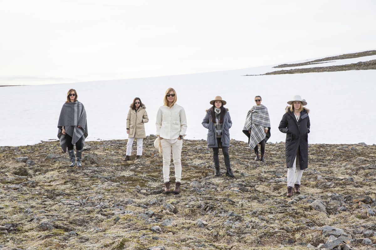 A group of women wear the Woolrich x Westerlind capsule collection in Iceland
