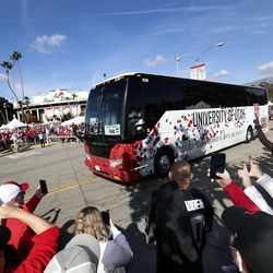 Busses full of University of Utah football players arrive at the 108th Rose Bowl game in Pasadena, Calif., on Saturday, Jan. 1, 2022.