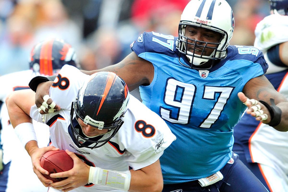 NASHVILLE TN - OCTOBER 03:  Tony Brown #97 of the Tennessee Titans pressures quarterback Kyle Orton #8 of the Denver Broncos during the first half at LP Field on October 3 2010 in Nashville Tennessee.  (Photo by Grant Halverson/Getty Images)