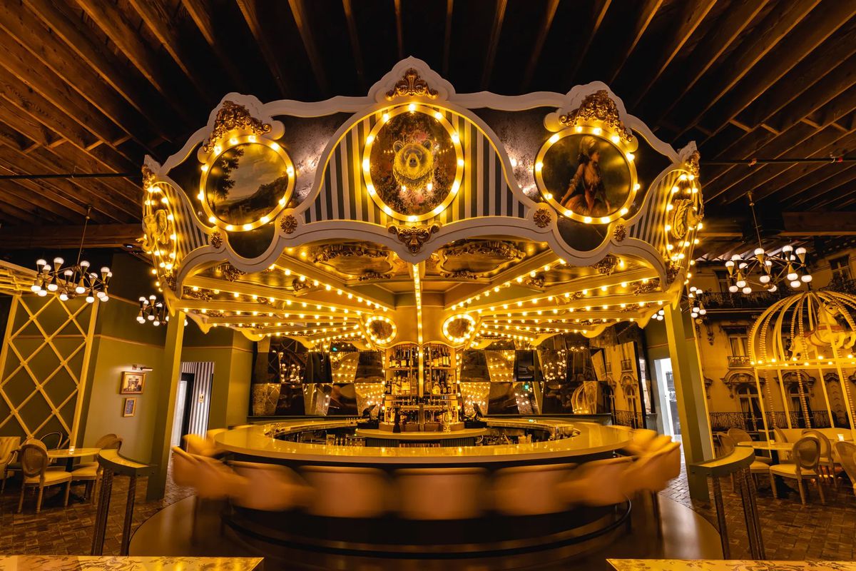 A carousel-shaped bar covered in lights.