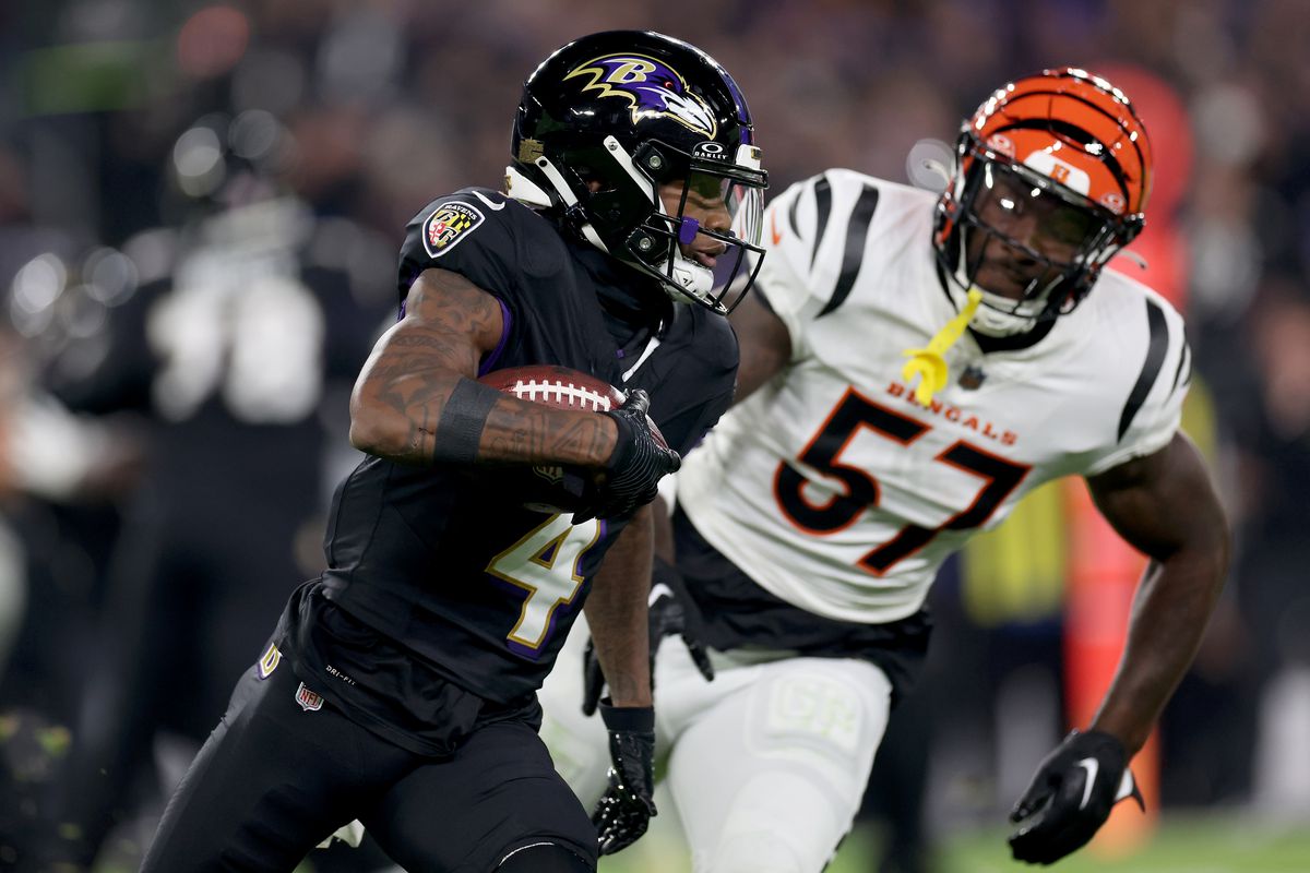&nbsp;Zay Flowers of the Baltimore Ravens runs with the ball against Germaine Pratt of the Cincinnati Bengals during the second quarter of the game at M&amp;T Bank Stadium on November 16, 2023 in Baltimore, Maryland.