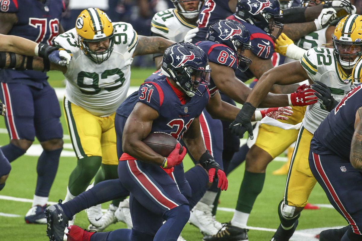 Houston Texans running back David Johnson (31) runs with the ball during the fourth quarter against the Green Bay Packers at NRG Stadium. Mandatory Credit: Troy Taormina