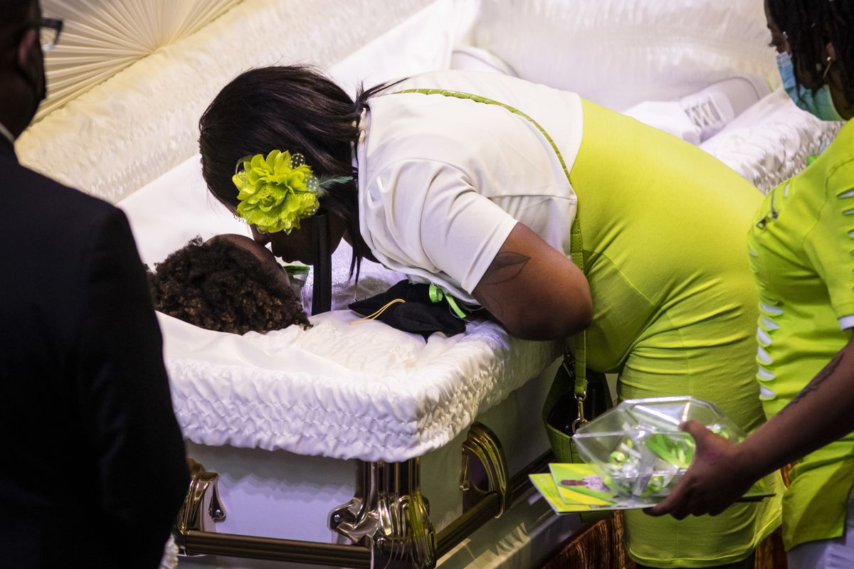 Teirra Black kisses her son, 13-year-old Jamari Dent, during his funeral at Greater Harvest Baptist Church at 5141 S. State St. in Washington Park on the South Side, Tuesday, June 22, 2021. His family said he suffered permanent brain damage when he hanged himself in a suicide attempt in 2019 after months of bullying by Chicago Public Schools staff and students.