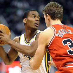 Utah Jazz point guard Alec Burks (10) looks for an outlet as Chicago Bulls small forward Mike Dunleavy (34) defends during a game at EnergySolutions Arena on Monday, Nov. 25, 2013.