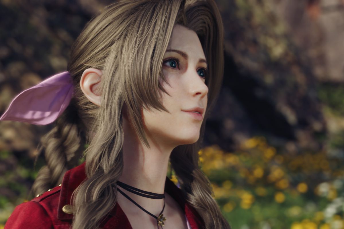 Aerith Gainsborough, with a pink bow in her hair, looking upward in Final Fantasy 7 Rebirth