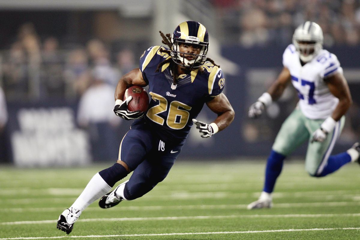 Aug 25, 2012; Arlington, TX, USA; St Louis Rams running back Daryl Richardson (26) carries the ball during the second quarter against the Dallas Cowboys at Cowboys Stadium. Mandatory Credit: Tim Heitman-US PRESSWIRE
