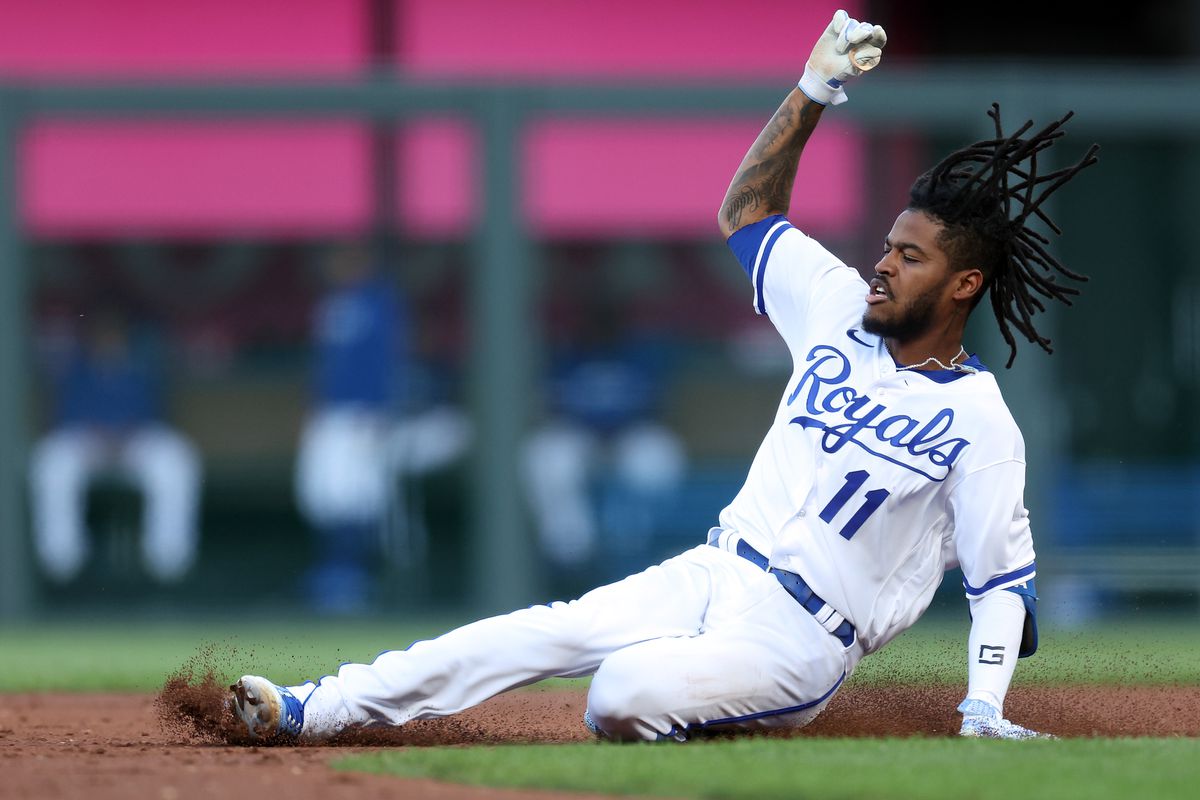 Maikel Garcia #11 of the Kansas City Royals slides into second base for a double during the 1st inning of the game against the Seattle Mariners at Kauffman Stadium on August 16, 2023 in Kansas City, Missouri.