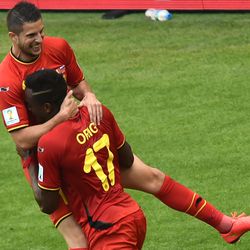 Belgiums forward Divock Origi celebrates with teammate Kevin Mirallas