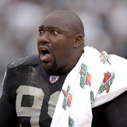 Oct 1, 2006 Oakland, CA, USA: Oakland Raiders defensive tackle (99) Warren Sapp argues with an Oakland Raiders coach during the 4th quarter against the Cleveland Browns at McAfee Coliseum in Oakland, CA. Mandatory Credit: Kyle Terada-US PRESSWIRE Copyrigh