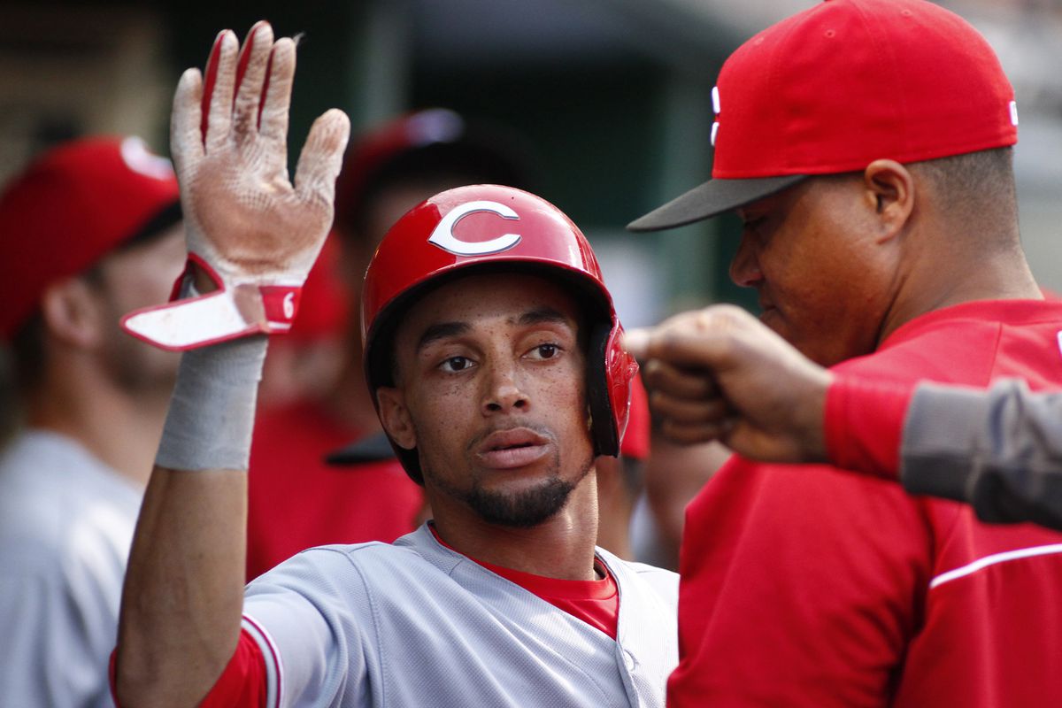 Someone's trying to punch Billy Hamilton.  Travis Snider, maybe?