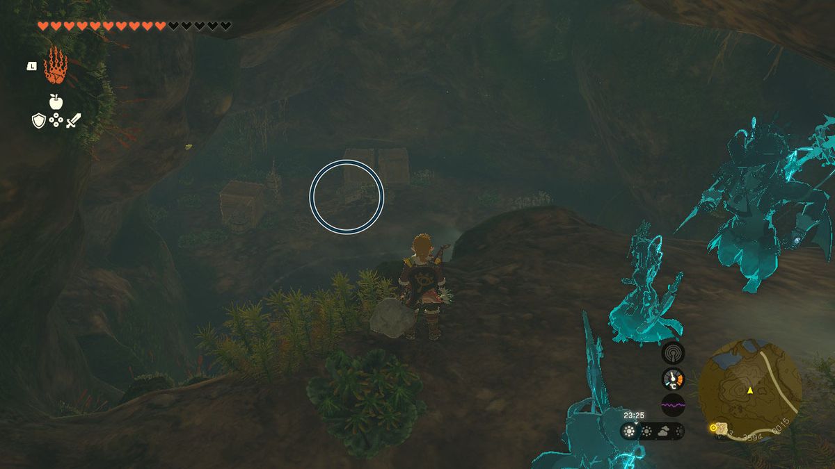 Link looks at a chest containing ancient blades in a cave in Zelda Tears of the Kingdom.