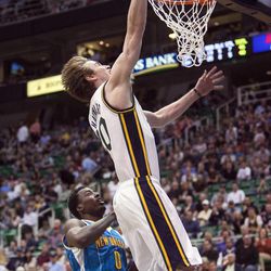 Utah's Gordon Hayward drives to the basket ahead of New Orleans' Al-Farouq for a lay-up as the Utah Jazz and the New Orleans Hornets play Friday, April 5, 2013 at EnergySolutions Arena in Salt Lake City. Utah won 95-83.