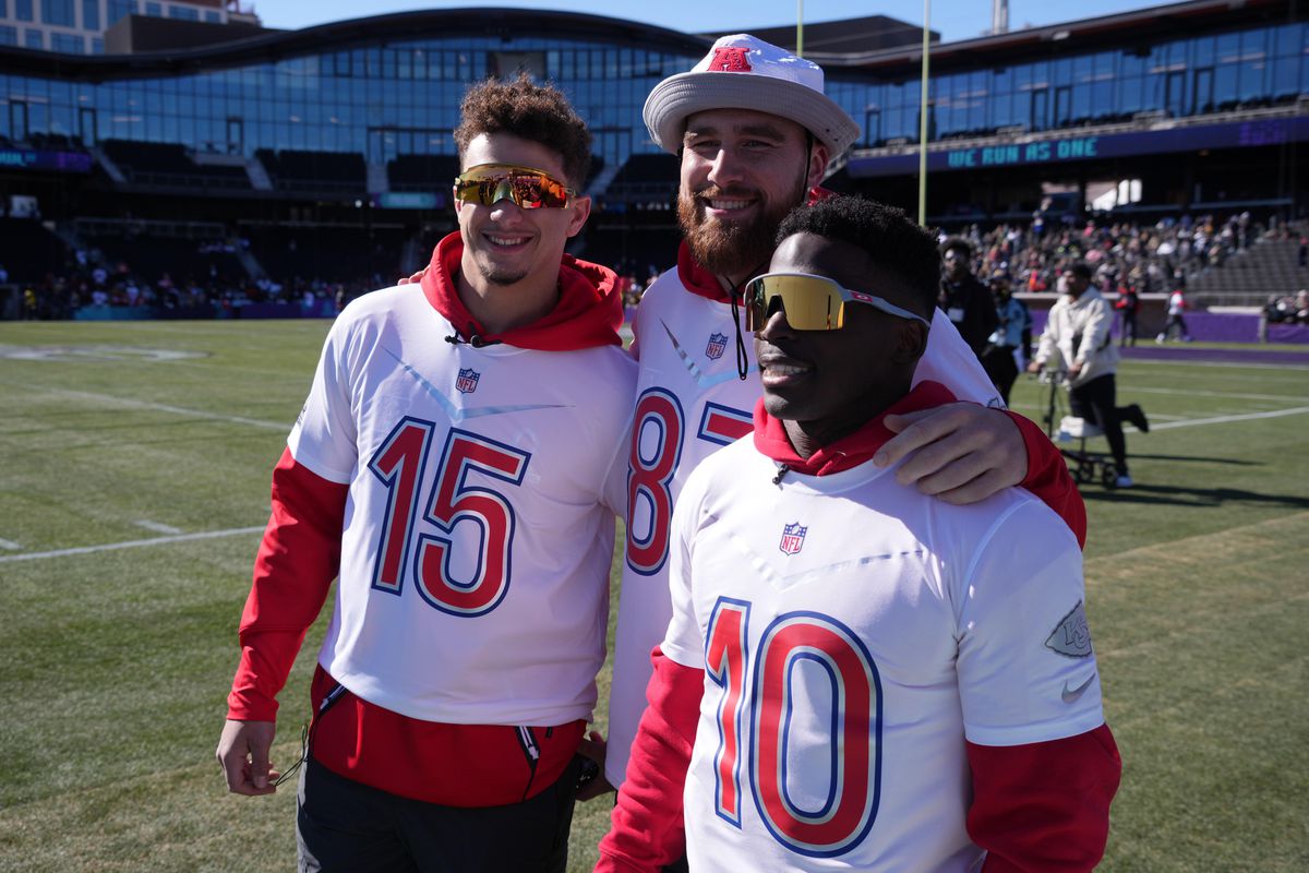 Kansas City Chiefs quarterback Patrick Mahomes (15), tight end Travis Kelce (87) and receiver Tyreek Hill (10) pose during AFC practice for the Pro Bowl at Las Vegas Ballpark. Mandatory Credit: Kirby Lee
