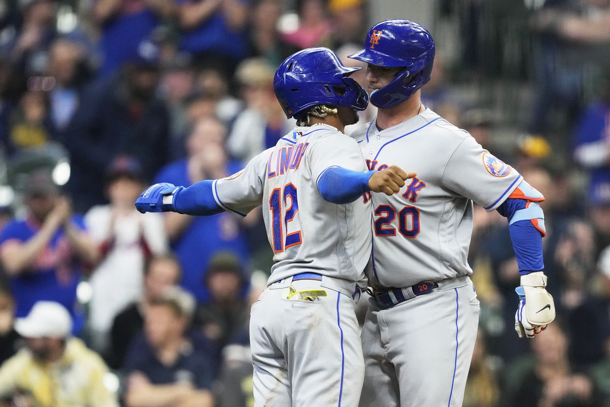 Pete Alonso of the New York Mets celebrates with Francisco Lindor after hitting a two-run home run against the Milwaukee Brewers in the third inning at American Family Field on April 05, 2023 in Milwaukee, Wisconsin.